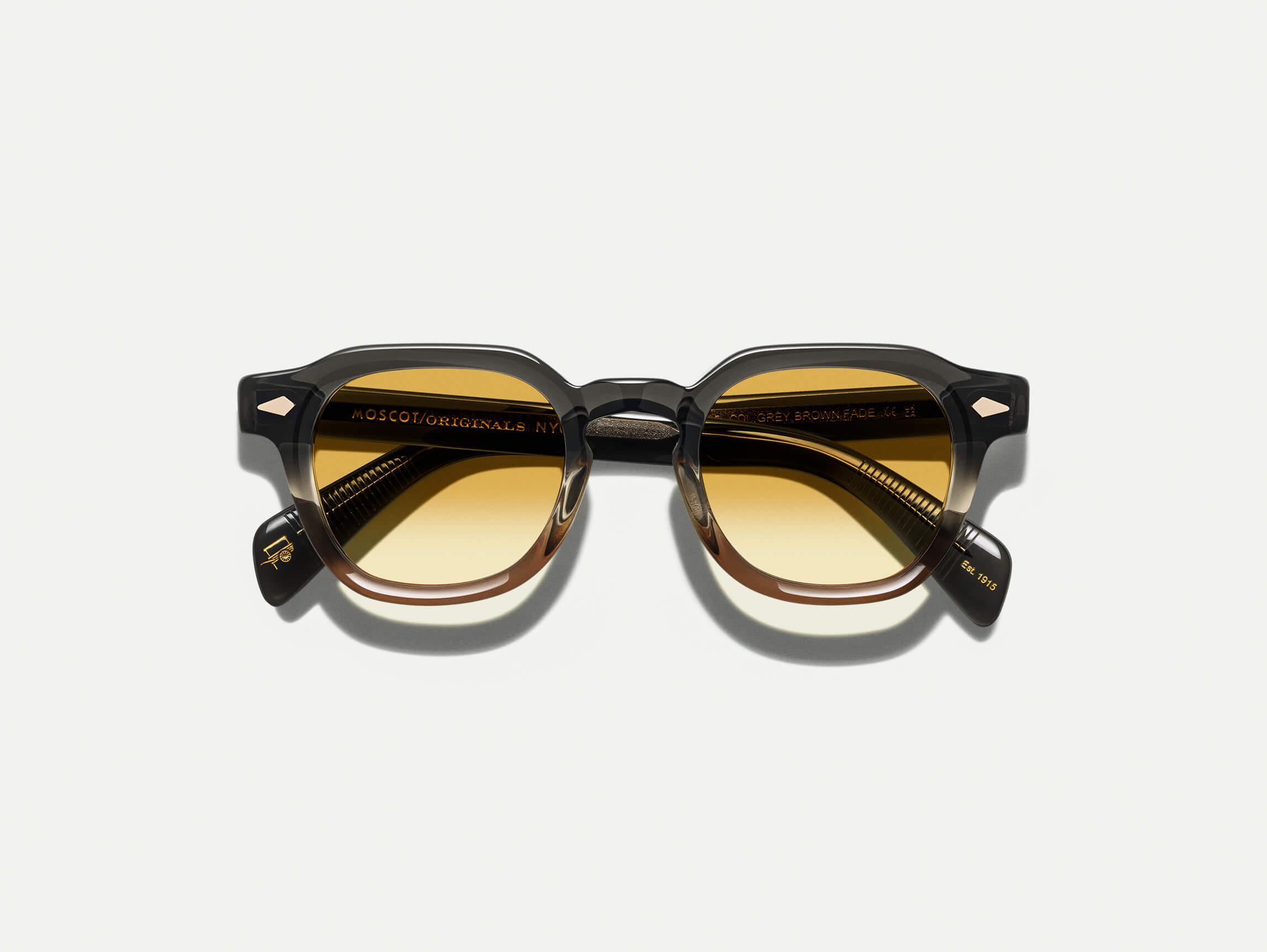 Moscot Dolt Sun — Grey-Brown Fade, tamanho 49-23, frente